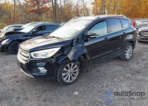 2017 Ford Escape Titanium z USA, uszkodzony, nr VIN 1FMCU9JD2HUD71023